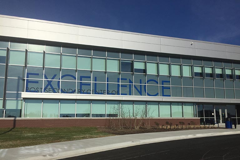 Building that has the word excellence on it